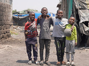 a group of children standing next to each other