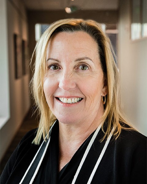a woman with a black blouse