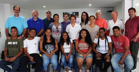 Children International staff and board members meet with youth